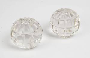 A pair of cut glass spheres. 10cm.