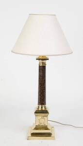 A brass Doric column lamp, 20th Century with a cream parchment shade. 62cm high