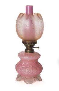 Two Victorian ruby glass bedside oil lamps. Tallest 30cm