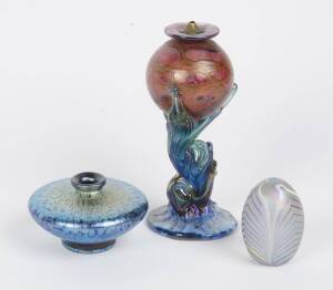 An Australian iridescent art glass oil lamp, vase & paperweight, 20th Century. Tallest 20cm.