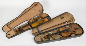 Two German trade violins in cases with bows. 