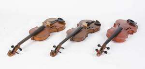 Three assorted Bohemian trade violins, early 20th Century. In cases (1 bow) 