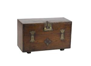 A Korean Elm coin chest, 19th Century. 43m high, 71cm wide, 31cm deep