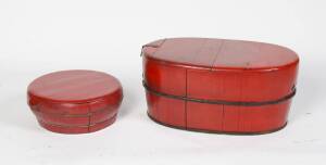 Two Chinese red lacquered rice carriers. Largest 29cm high, 60cm wide, 43cm deep. 