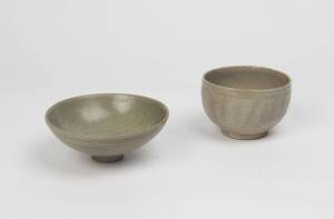 Two Chinese incised celadon bowls, Song-Yuan dynasties, 10th-13th Century. 12.5cm and 16.5cm diameter