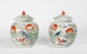 A pair of Chinese porcelain lotus vases and covers. 35cm high