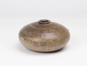 A Khmer stoneware oil jar, 11th-12th century