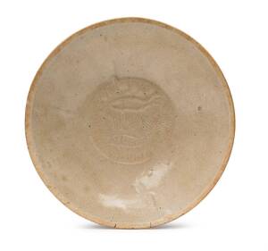 A Song Dynasty (960-1279) Ding yao type white glazed bowl, interior decorated with a pair of fish. 16cm diameter