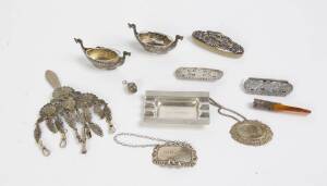 A group of silver & silver plated object including chatelaine clasp, salt cellars, decanter labels etc. (10 items).