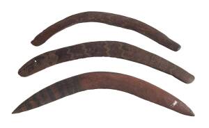 A group of 7 Western Australian Boomerangs with incised and ochre decoration, mostly 19th century. Average 63cm.