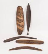 A group of 5 South Australian transitional artifacts, including a Coolamon, Woomera, shield & 2 boomerangs 