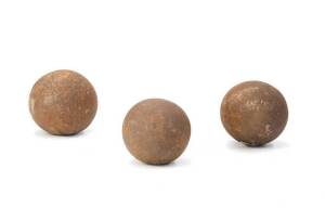 Three cast iron cannon balls. Approximately 16 to 18cm diameter 