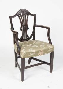 A George III mahogany Sheraton style elbow chair, Circa 1780. 