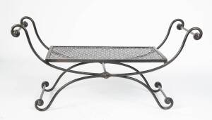 A wrought iron folding occasional table. 110cm high, 92cm wide, 46cm deep. 