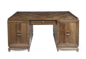 A limed oak pedastal desk, first half of the 20th Century. 81cm high. 158cm wide, 88cm deep. 