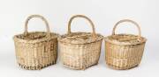 A group of 4 wicker wine baskets. 