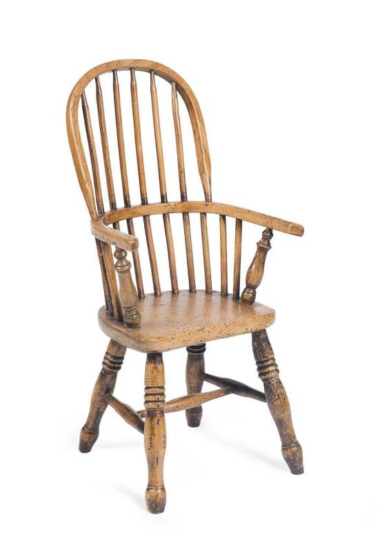 A child's elm wood Windsor chair. 