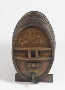 A French oak metal bound wine barrel, with fixed brass tap. 70cm high, 49cm wide, 70cm deep. 