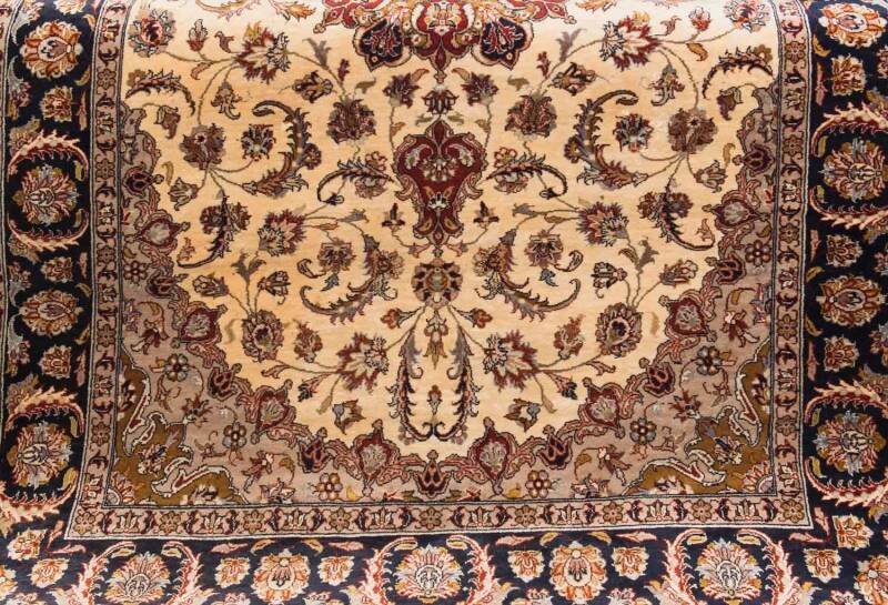 A floral patterned hand woven Persian style fine weave rug, made in Pakistan. 140 x 215