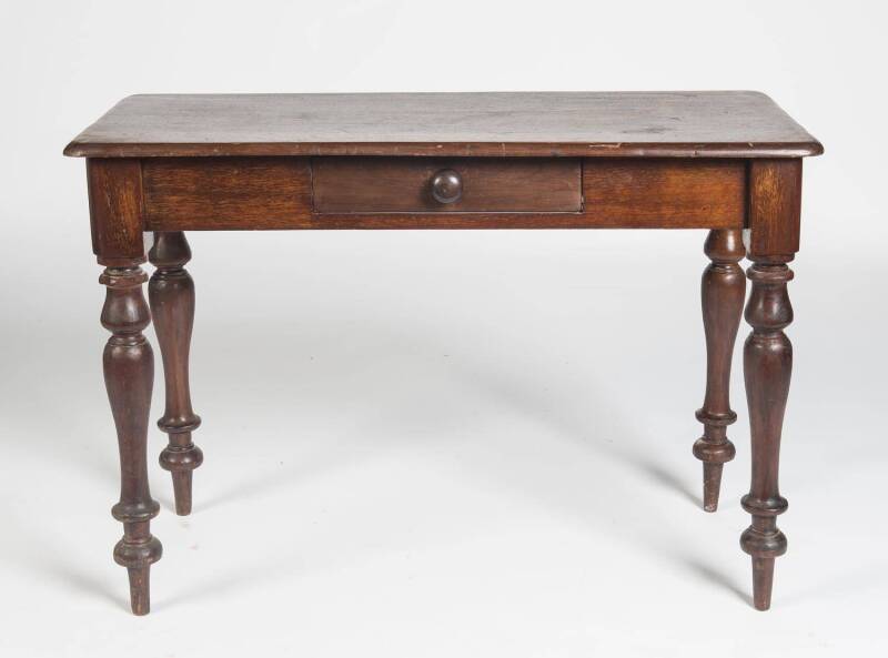 An Australian cedar single drawer side table, 19th Century. 72cm high, 107cm wide, 50cm deep