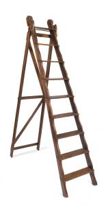 A French provincial oak ladder bearing plate with "Systeme Brevete Alexe Blanchart". 125cm high. 