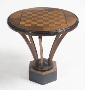 An Art Deco parquetry inlaid glass top games table. 65cm high, 64cm diameter.