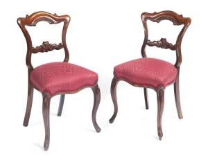 A set of 8 rosewood dining chairs with French cabriole legs, mid 19th Century (one badly damaged). 