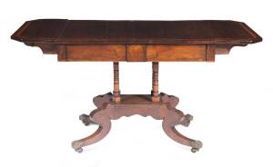 A rosewood drop-side centre table with satinwood inlay, early 19th Century. 73cm high, 95cm wide, 64cm deep