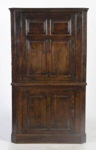 18th Century two door oak corner cupboard. Height 191cm, width 110cm.