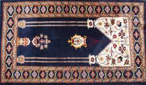 Hand knotted woollen carpet from Pakistan in the Bokhara manner. 152 x 95cm 