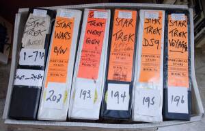 A COLLECTION OF MOVIE STILLS & PUBLICITY PHOTOS: S: Featuring The Star Trek series of films (8 Volumes) & Star Wars (2 Volumes) plus 1 album of Star Trek autographed photos and ephemera; duplication throughout. (Many 100's).