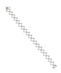 A diamond bracelet, of open zigzag design.18ct white gold. Length 17.5cm. Weight: 14.3 grams. 