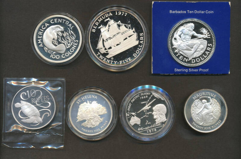 Carton of 1970s silver proof singles, mostly British Commonwealth including 1974 Seychelles 10 Rupee x13 loose and x6 cased, Isle of Man Crowns x13, Bermuda, Canada, Cook Islands, Fiji, Guyana, NZ, Mauritius, PNG, Sierra Leone, Singapore, plus Austria 1