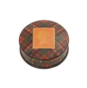 MACHINE WARE: Circular machine-ware box 4½cm diameter with illustration of GB 1d red on the lid & Macbeth tartan pattern.