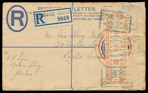 1942 commercial usage to Kuala Lumpur of Negri Sembilan (?) size G Registration Envelope with the "stamp" obscured by a scarlet/white resealing label tied by Censor "chops" in black, 'JOHORE BAHRU' handstamp on provisional registration label, minor repair