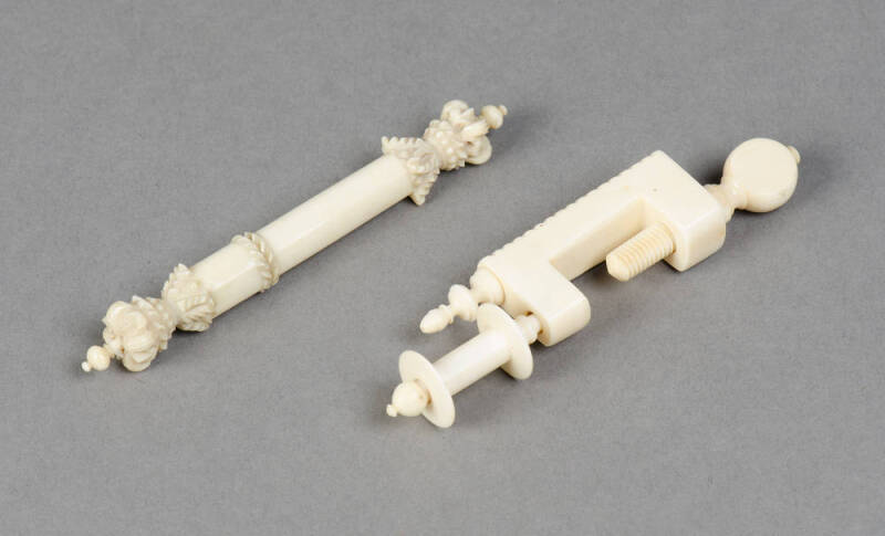 Antique ivory sewing clamp & ivory needle case with carved crown finials.