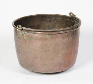 An old copper pot. 38cm high, 64cm diameter