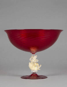 MURANO RUBY GLASS comport with dolphin figured stem with gold fleck inclusions. 22 x 27cm. Excellent condition