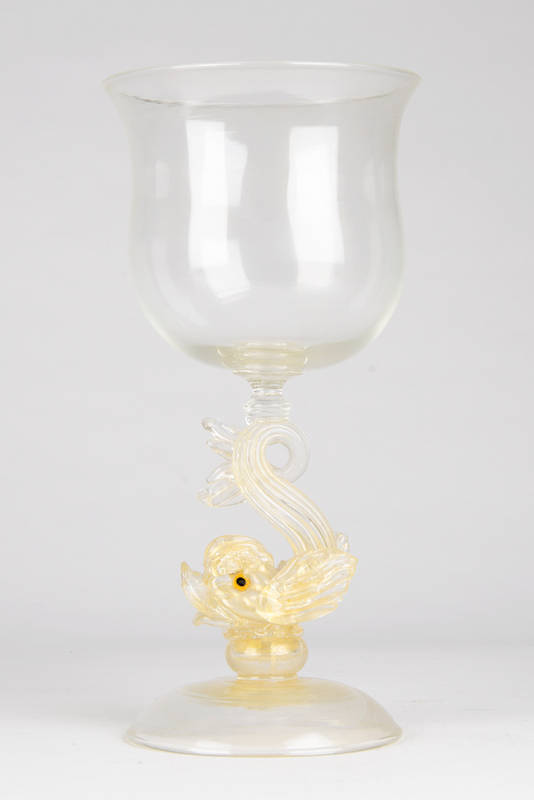 MURANO GLASS VASE: Goblet form with dolphin stem in clear glass with gold fleck inclusions. 31cm, VG condition. 