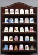 THIMBLES: Collection of 68 assorted thimbles including sterling silver, enamel, porcelain etc