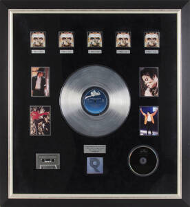 MICHAEL JACKSON PLATINUM RECORD: RIAA certified platinum record display, "Commemorating the sale of more than 5 Million copies of Michael Jackson's Album, Cassette and CD "DANGEROUS", framed & glazed, overall 80x86cm.