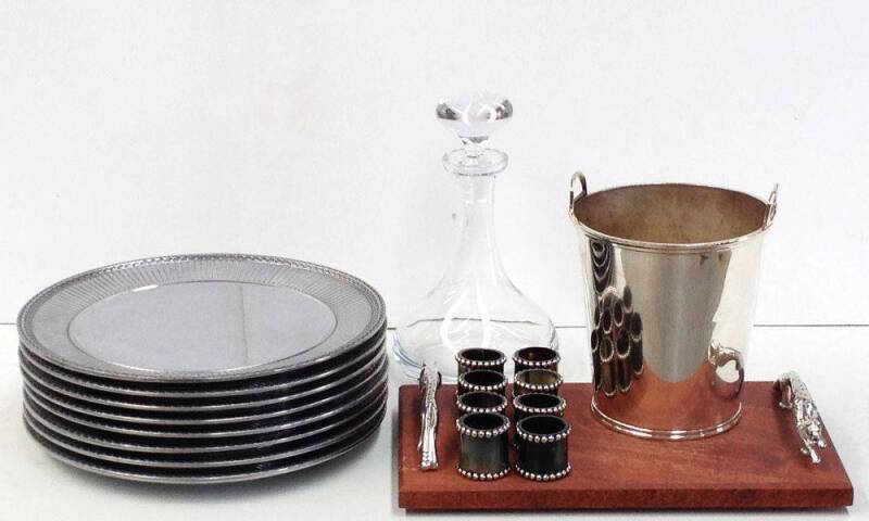 Remains of collection: Wedgwood pewter serving trays (8); cheese board; napkin rings; comport; decanter & ice bucket.