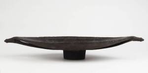 A FEASTING BOWL. Schouten Islands, Papua New Guinea. Carved wood & pigment. 56 x 28 x 8.2cm