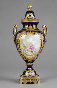 French blue porcelain lidded urn stamps "CHATEAU DE BLOIS" with crossed arrow mark. Impressive hand-painted romantic scenes signed J.MISSANT. Gilt decorated with brass handles, base & finial. Early 20th century. 41cm, VG condition