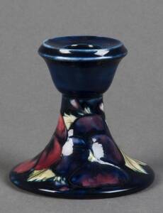 MOORCROFT: Pansy patterned candle holder on blue ground. 8.5cm. Rare & VG condition