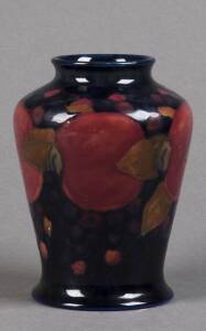 MOORCROFT: pomegranate patterned vase circa late 1920s. 13cm VG condition