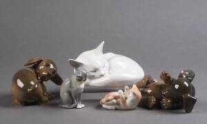 ROYAL COPENHAGEN: Group of Danish porcelain animals comprising; a pair of puppy dogs in playful poses; sleeping white cat; & two cats with gold back stamps. 7cm to 14cm, VG condition