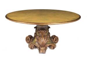 A Continental scroll carved, painted & gilded circular centre table. 72cm high, 160cm diameter.