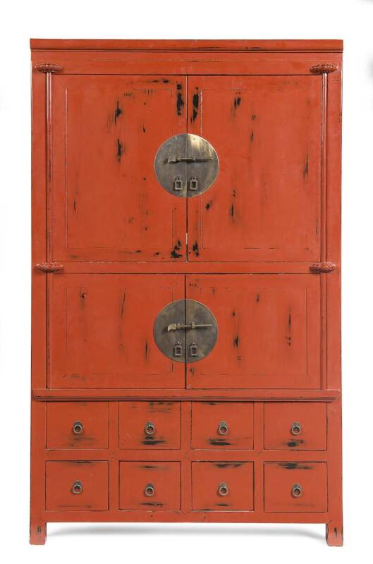 A Chinese red lacquer cabinet