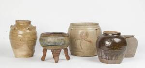 A group of five stoneware jars, three glazed and one un-glazed, 16th Century and later. 19-30cm high